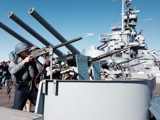 Crewmen firing gun at Living History Crew Drill